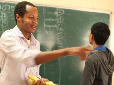 Godswill Muzarabani of Zimbabwe teaches English in Laos