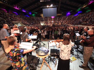 view from stage of stadium full of people