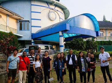 group of people outside of seminary building