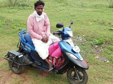 Mr Nagamanikam on his motorcycle