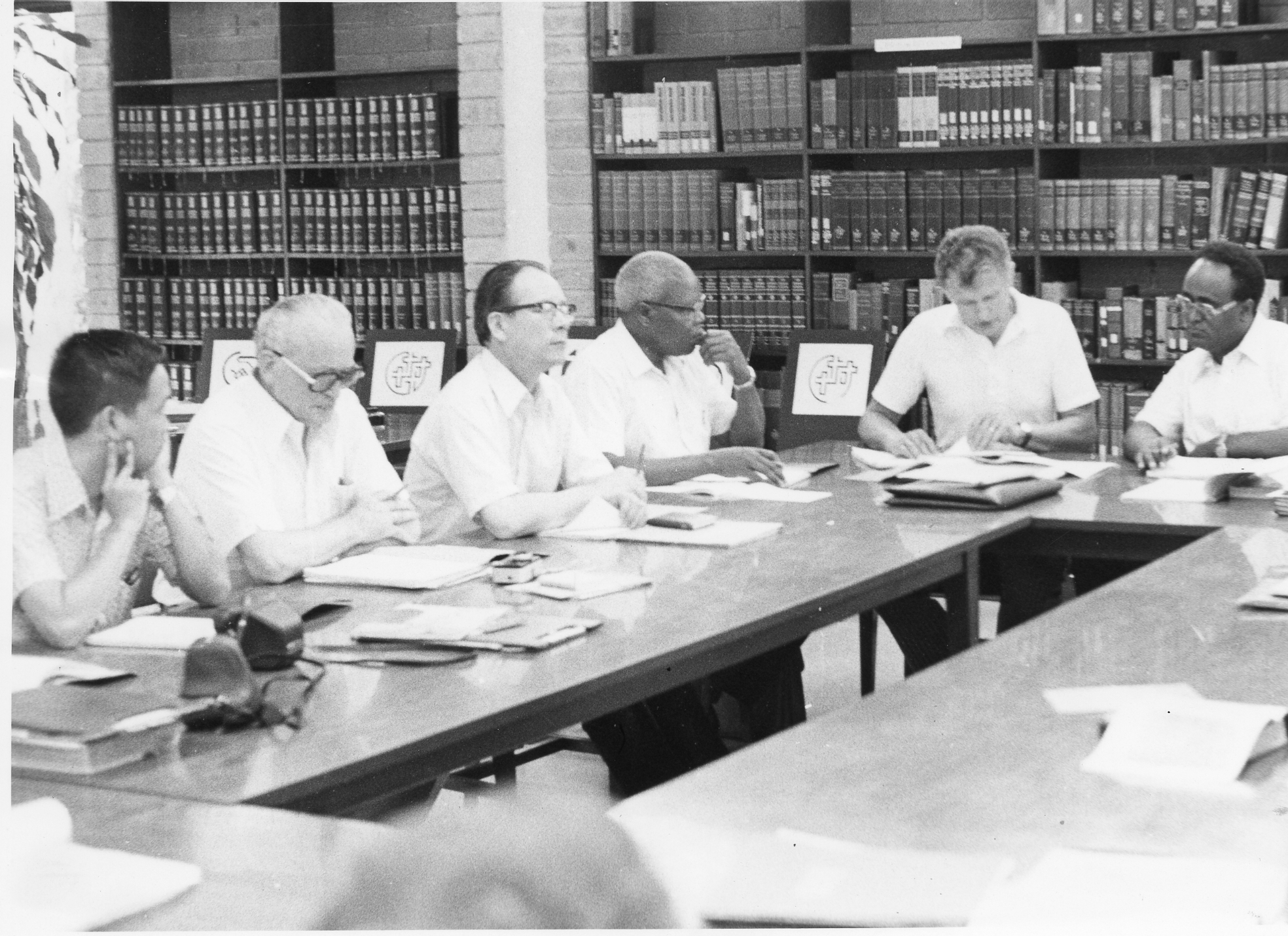  executive secretary Paul Kraybill (USA), president Charles Christano (Indonesia), recording secretary Robert Kreider (USA), Marvin Hein (USA), Carl Brusewitz (Netherlands), and Philemon Kumalo (Zimbabwe). 